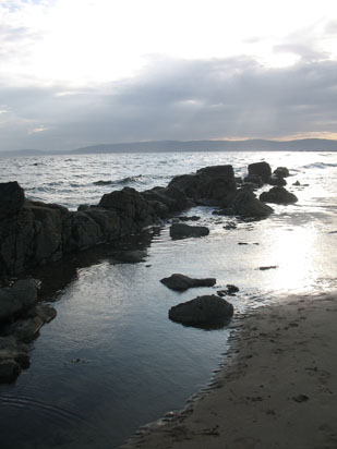 Picture of   Blackwaterfoot beach with the tide out is shown on this page.