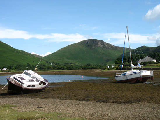 Picture of   The small boat near Lochranza castle is shown on this page.