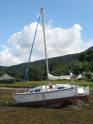 Picture of   The small boat near Lochranza castle is shown on this page.