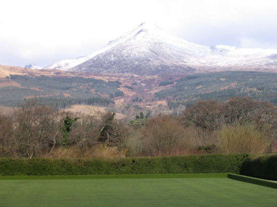 A snow-capped Goatfell from Brodick.