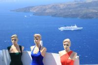  Colourful Mannequins With Cruise Ship In Background