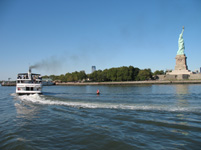 A Boat sailing to the Statue of Liberty