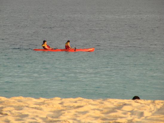 club paradise coron philippines couple in canoe picture