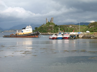caisteal maol with boats isle of skye picture